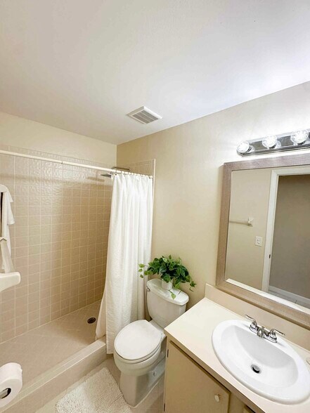 Awesome walk-in shower with a rainfall shower head! - 3161 SE Aster Ln