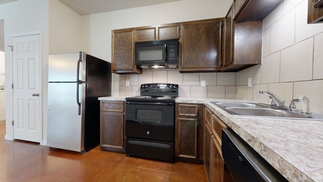 Building Photo - ALL STAINED CONCRETE FLOORING DUPLEX IN HA...