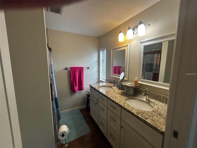 Building Photo - 5742 Camelot Dr N