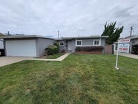 Building Photo - TURNKEY-RENT READY SPACIOUS 2BD/2BA HOME, 2-CAR GARAGE WITH AN AUTOMATIC ROLL-UP DOOR, LARGE COVE...