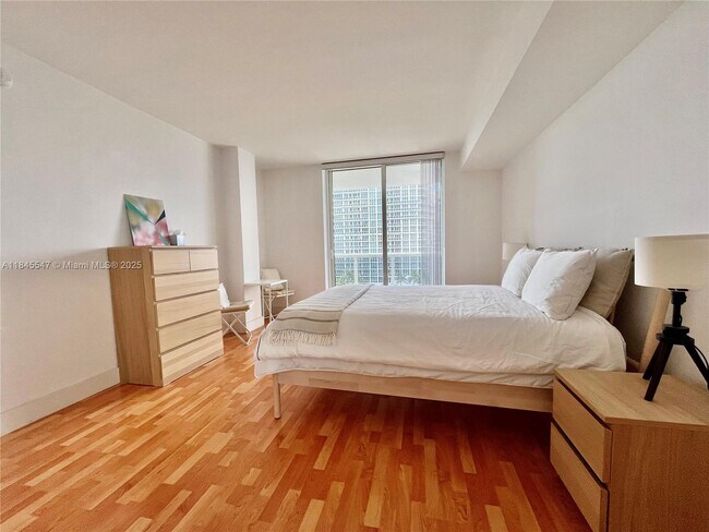 Building Photo - 10275 Collins Ave