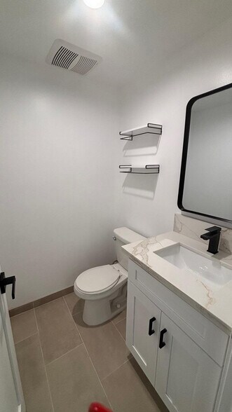 POWDER ROOM DOWNSTAIRS - 4880 Bruges Ave