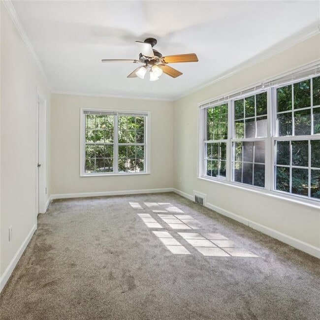 Building Photo - 3859 Peachtree Dunwoody Rd