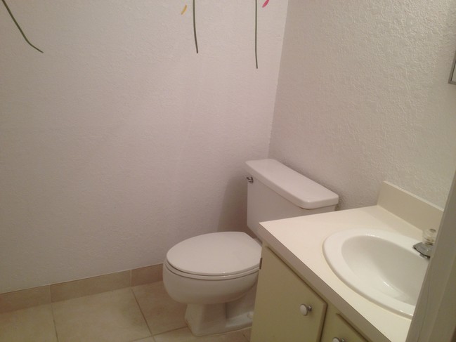 Two piece bathroom at front foyer - 4145 NW 90th Ave