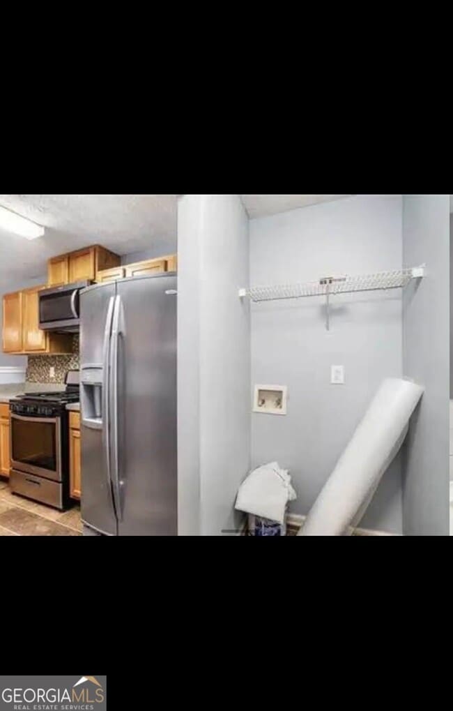 Building Photo - 5563 Windfall Ln