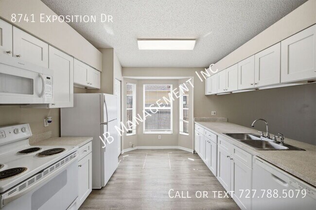 Building Photo - 8741 Exposition Dr