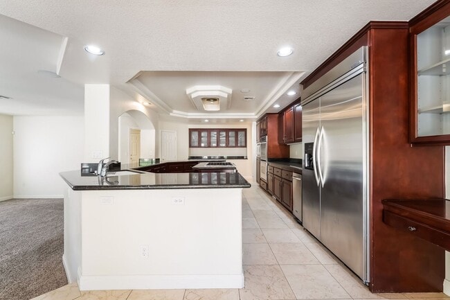 Building Photo - Beautiful Three Story, Five Bedroom Home with Lagoon Style Pool and Spa