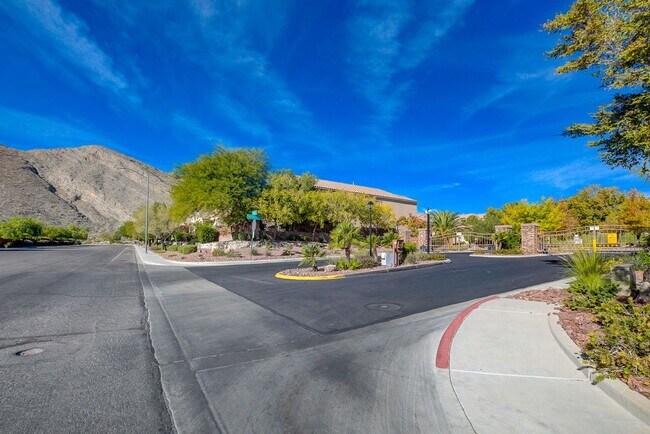 Building Photo - THIS 2 STORY HOME IN A GATED COMMUNITY HAS...