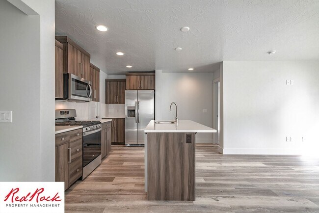 Building Photo - Innovative Design! 4 Bedroom Home in the Beautiful Desert Playa Community