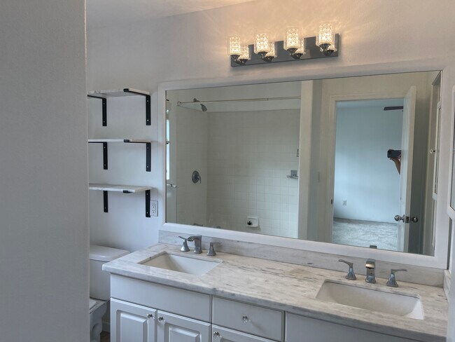 Primary bathroom - marble countertops, double vanity sink - 91-1031 Kaipalaoa St