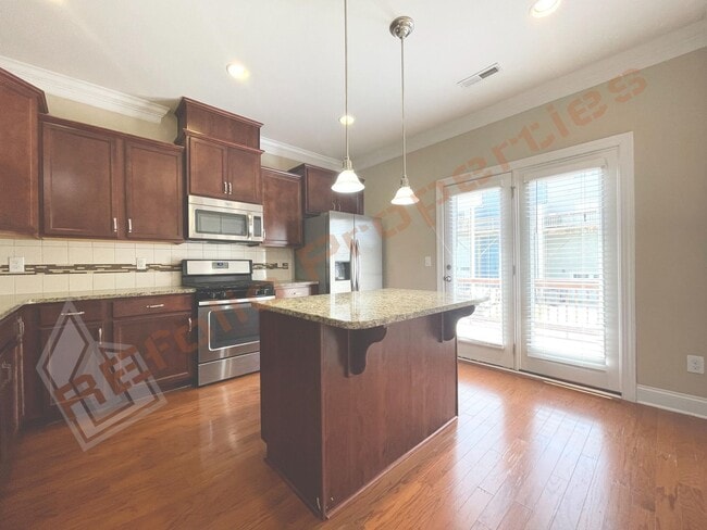 Building Photo - Lovely 3 Story 3 Bedroom 3.5 Bath 1 Car-Ga...