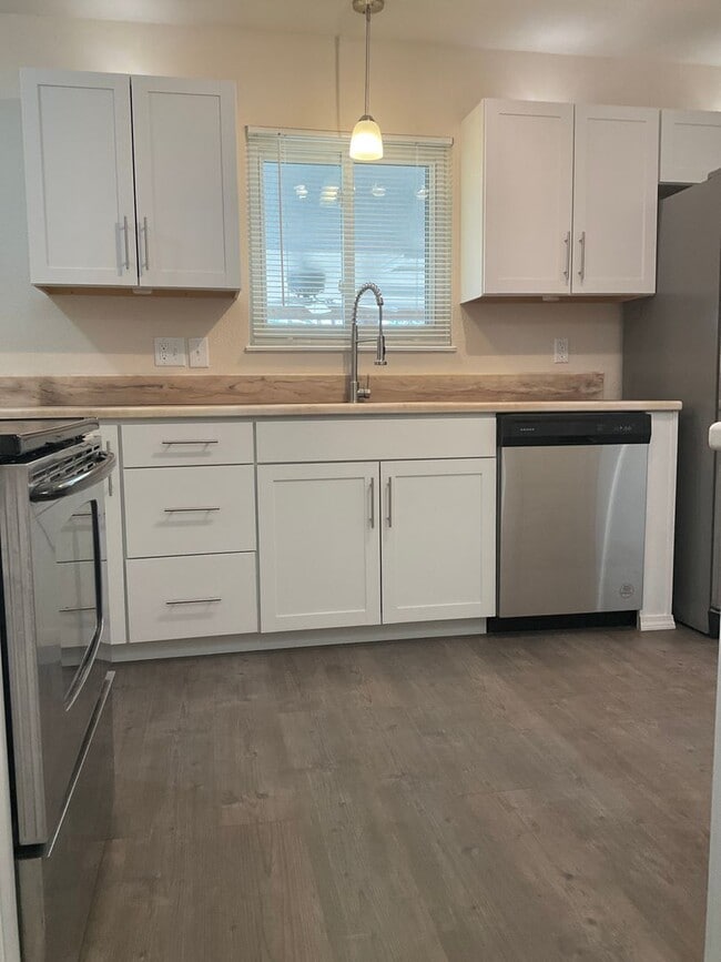 Building Photo - BEAUTIFULLY UPDATED RANCHER WITH FINISHED BASEMENT