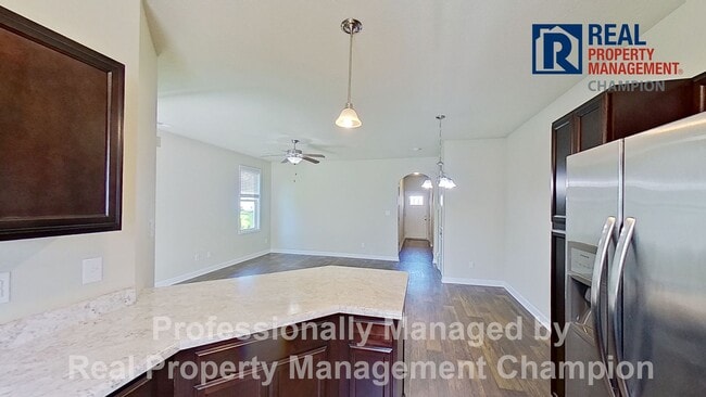 Building Photo - Beautiful Townhome with Open Floorplan and Covered Patio