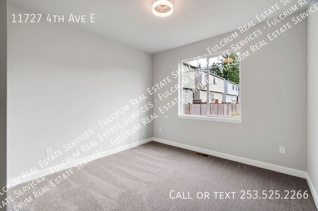 Building Photo - 11727 4th Ave E