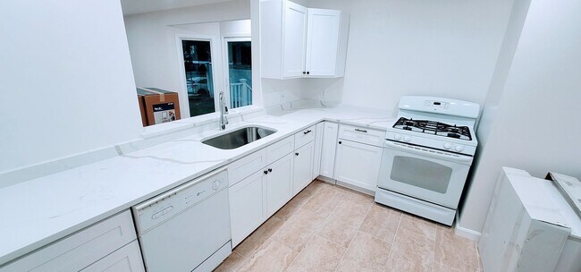 Building Photo - 3-Story Townhouse with Central Heat, AC and 2 Parking Spots Included