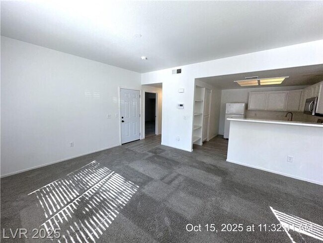 Building Photo - SPACIOUS FIRST-FLOOR CONDO LOCATED IN A GA...