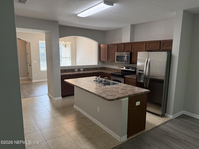 Building Photo - 4220 Plantation Oaks Blvd