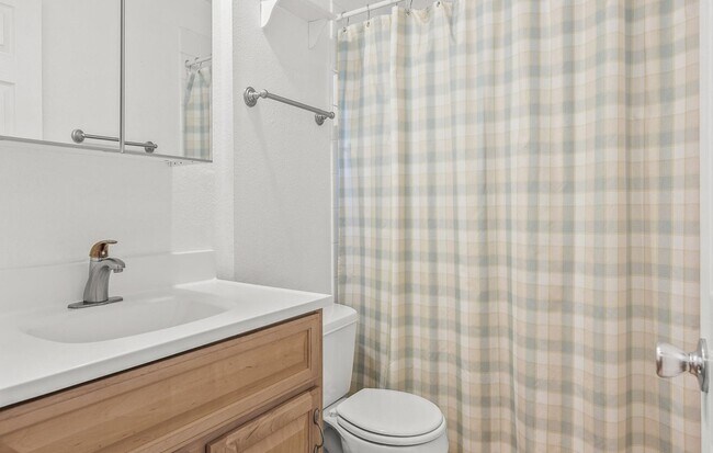 Building Photo - Spacious 2-Bedroom Condo with Forest Views, Private Balcony, In-Unit Laundry & Community Amenitie...