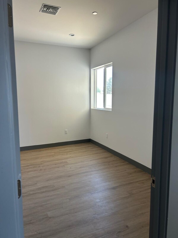 Building Photo - 9228 E Ave T 6