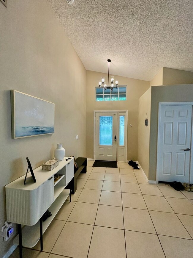Building Photo - Modern 4-Bed, 2-Bath Solar-Powered Home Near UCF