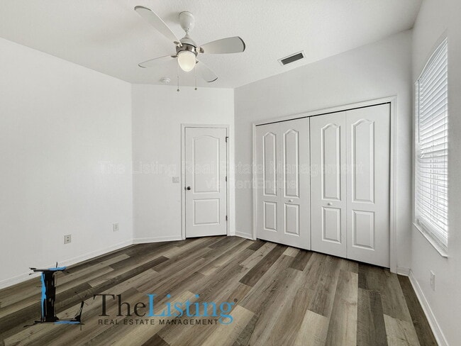 Building Photo - 7411 Surrey Wood Ln