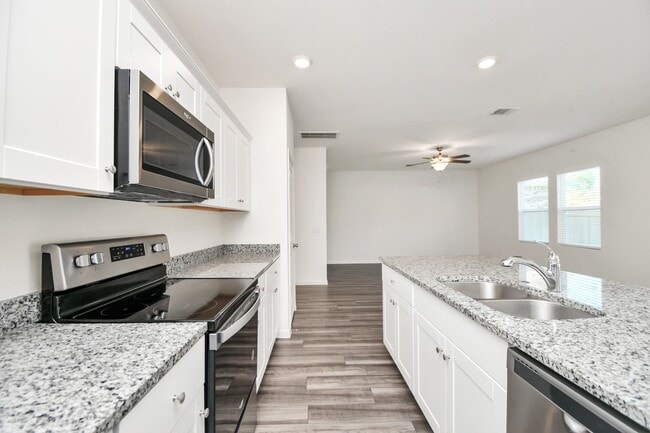 Building Photo - 7810 Carrotwood Ct