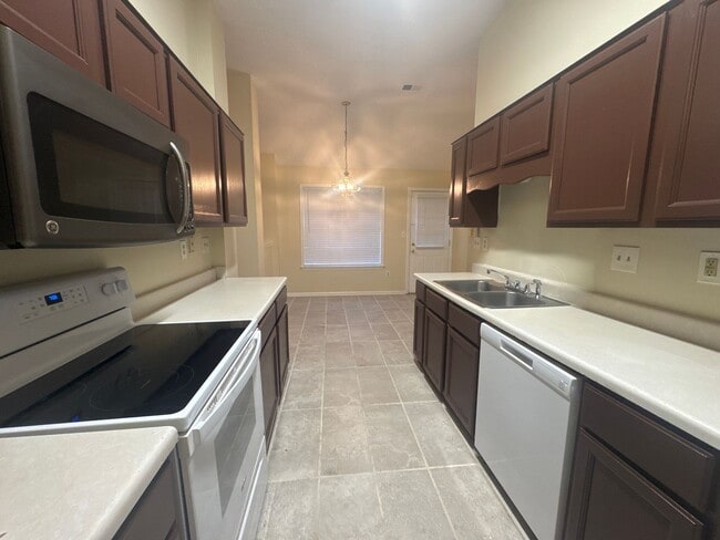Building Photo - 8699 Tropicana Dr N
