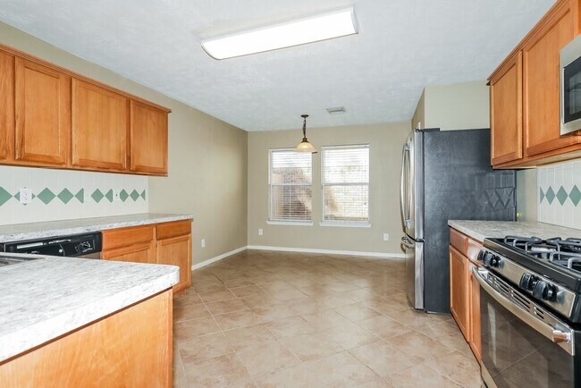 Building Photo - 10007 Willow Wood Way