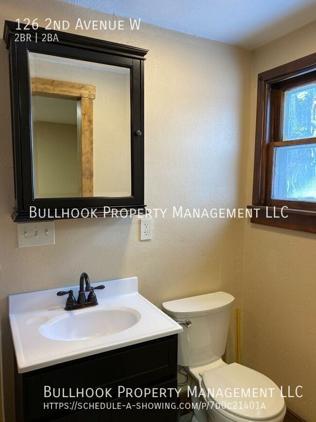 Building Photo - 126 2nd Ave W