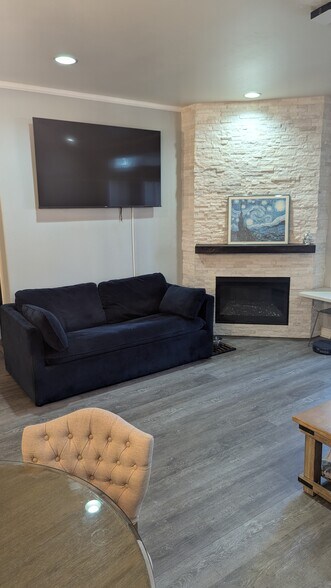 Living Room with sleeper sofa - 3990 Centre St