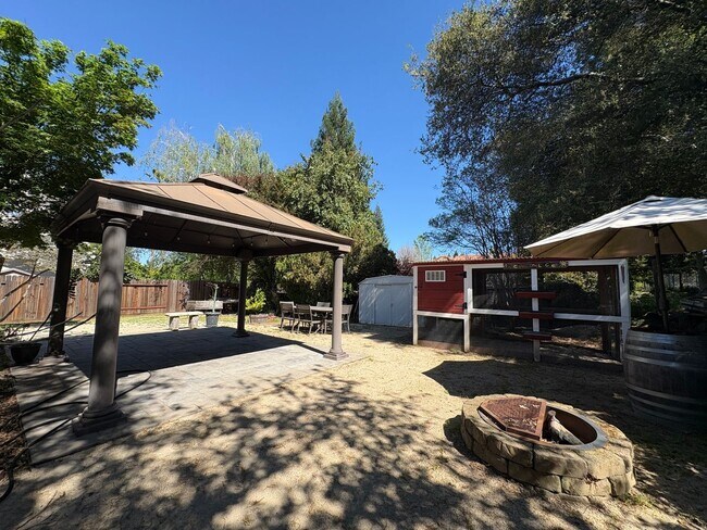 Building Photo - Your Private Escape – Charming Ranch-Style Home with Room to Breathe!