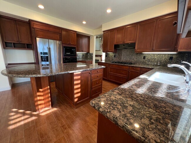 Building Photo - Room for Everyone: Meticulously Maintained 5-Bedroom Estate