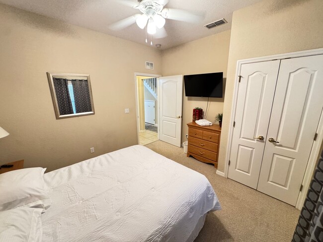 Building Photo - Fully Furnished 5-Bed End-Unit Townhome with Hot Tub in Gated Coral Cay! WASHER & DRYER INCLUDED!