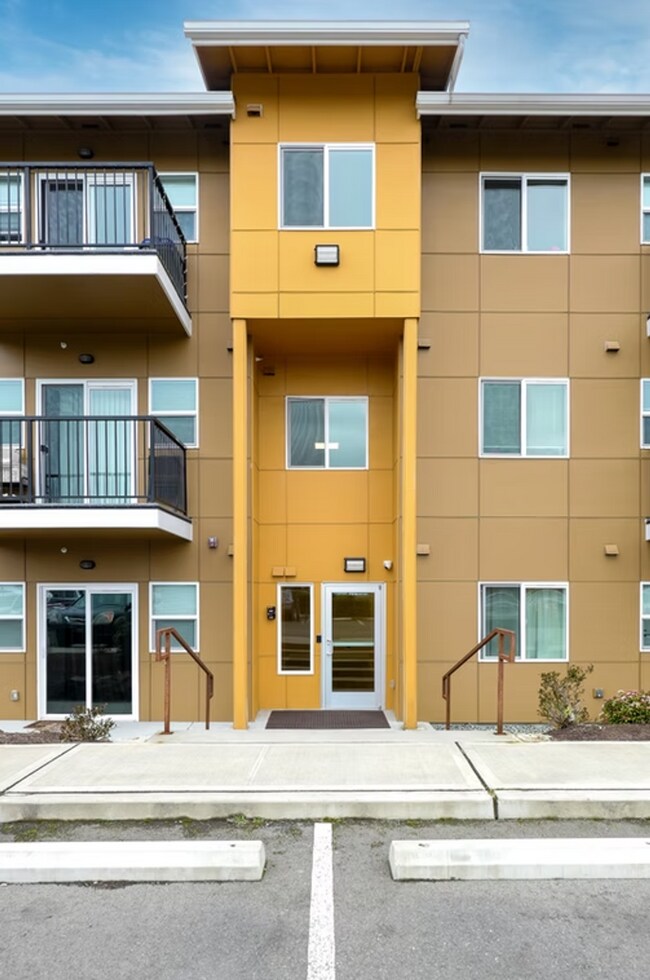 Building Photo - Sophisticated One-Bedroom Living at Marigold Apartments — Available Now