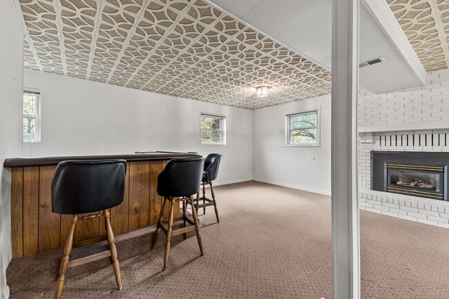 Fireplace in basement. - 1618 Oak Hills St