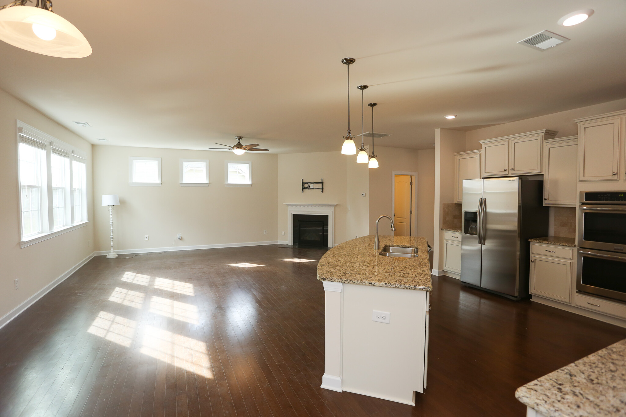 Kitchen opens to family room and breakfast nook - 2001 Trading Path Lane