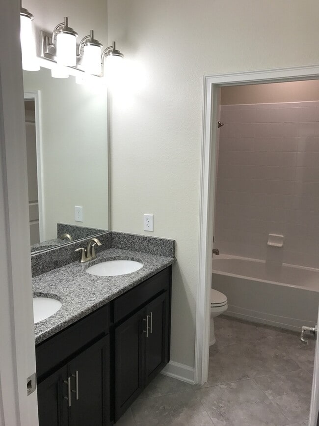 Building Photo - Just Listed! Newer 4/3 Home at The Oaks in...