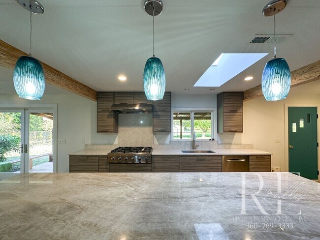 Building Photo - Mid-Century Modern Dream Home with Chef’s ...