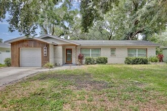 Building Photo - Gorgeous Waterfront 3/2 Mid-century Modern Style Home with a Covered Patio and a Large Backyard i...