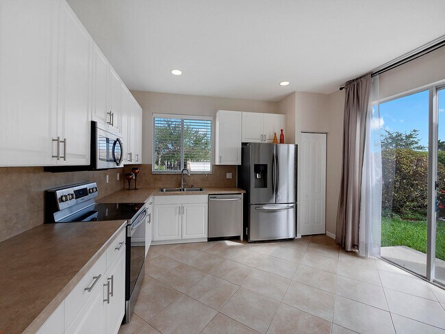 Building Photo - 9563 SW Flowermound Cir