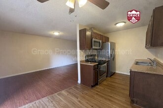 Building Photo - 10782 E Exposition Ave