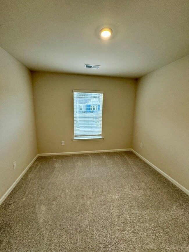 Building Photo - 4BR/2.5BA in Steel Creek's Brightwater Neighborhood