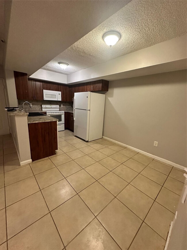 Building Photo - 5590 NW 61st St