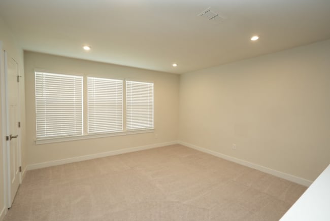 Building Photo - This wonderful home has a covered rocking chair front porch