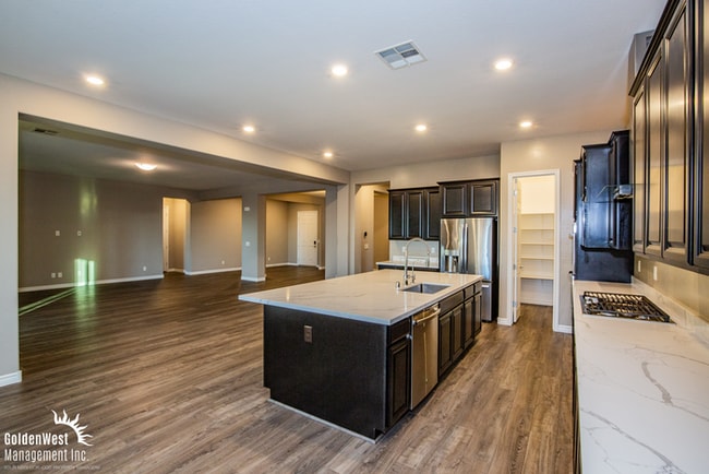 Building Photo - Welcome to this impressive single-story 4Bdm 3.5Ba residence located in a desirable Northwest Las...