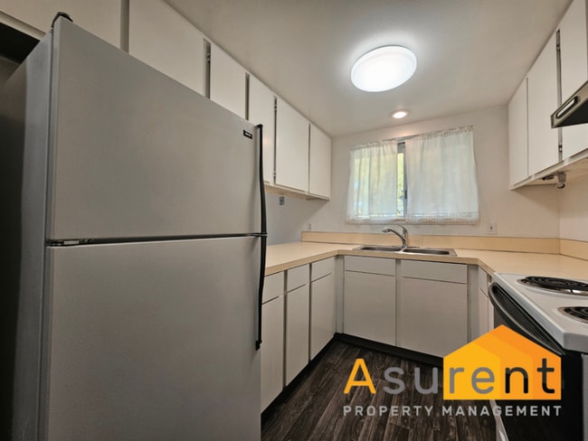 Building Photo - Bright & Spacious 2-Bedroom Apartment in A...