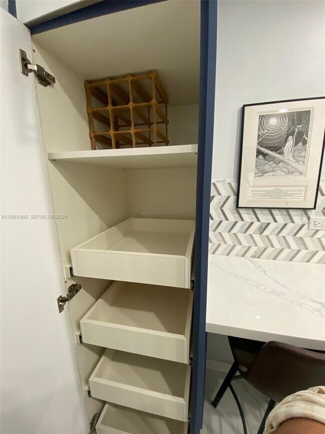 Building Photo - 5005 Collins Ave