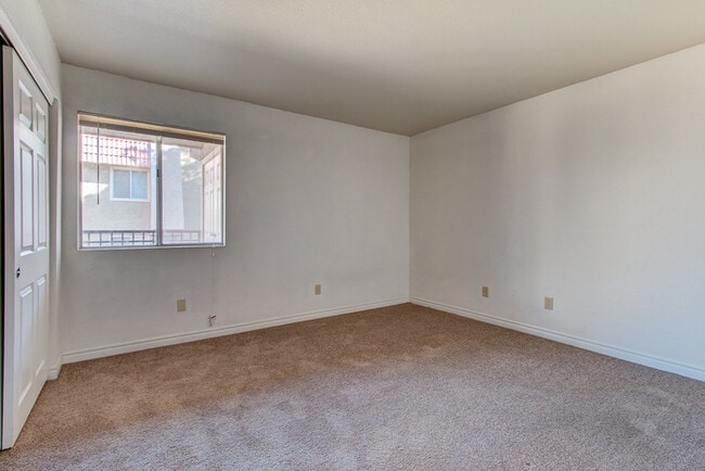 Building Photo - Guard-Gated Condo Living with Exceptional Community Amenities
