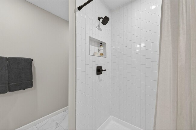 Building Photo - Westview townhome plan in Corcoran’s Hope Meadows community—a brand-new townhome development near...