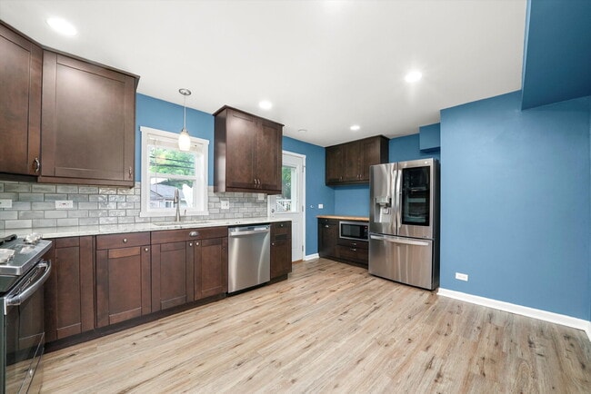 Building Photo - Stylish 4-Bedroom Home with Room to Work, ...
